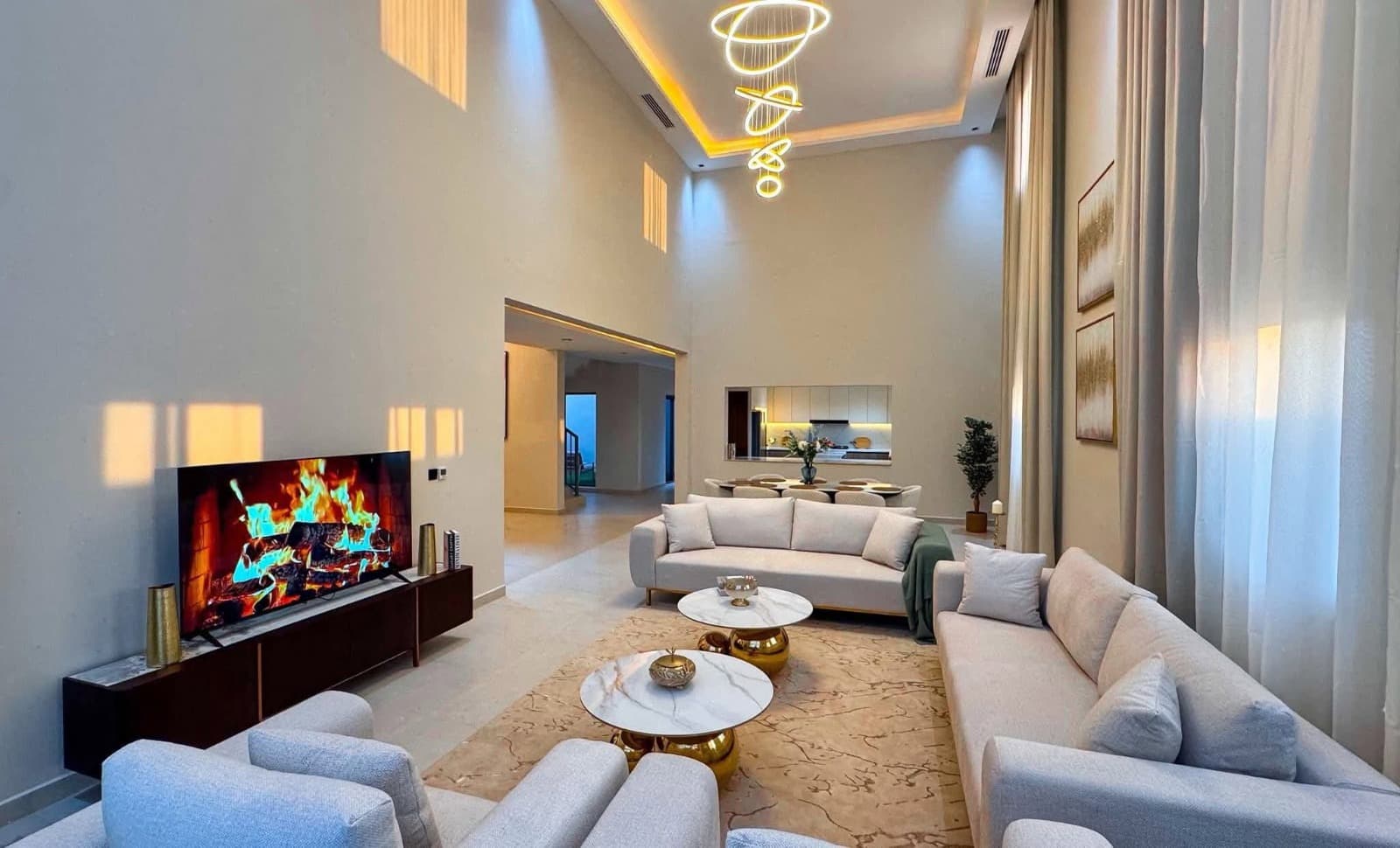 Double-height residential interior with integrated lighting and ventilation